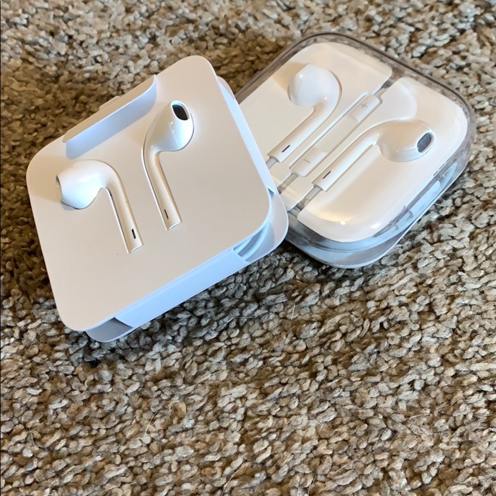 2 pair of apple head phones. New and older.